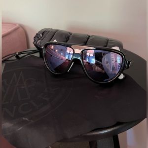 MONCLER sunglasses with LEATHER side shield.